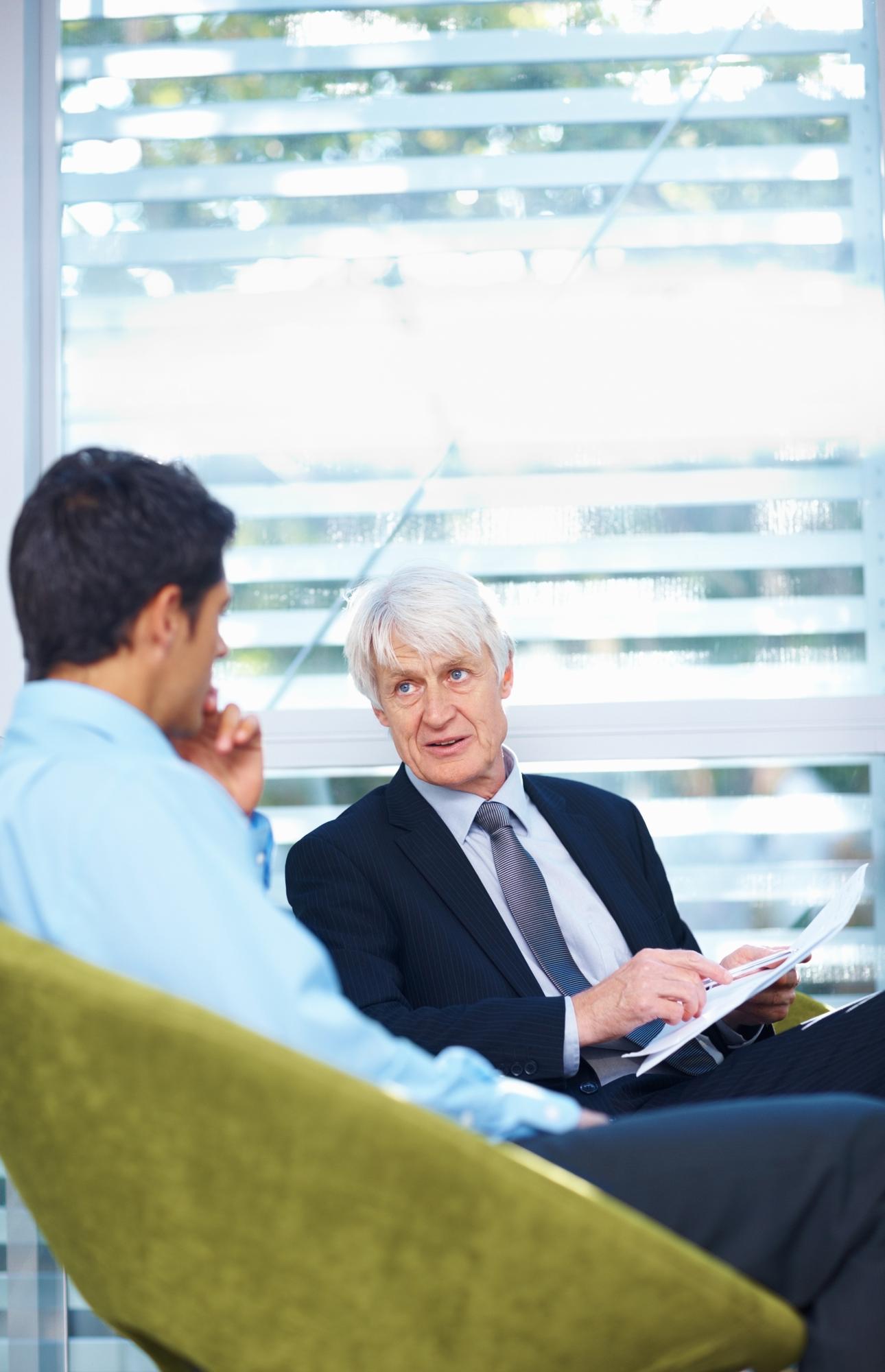 Real estate attorney reviewing property agreements and transaction documentation